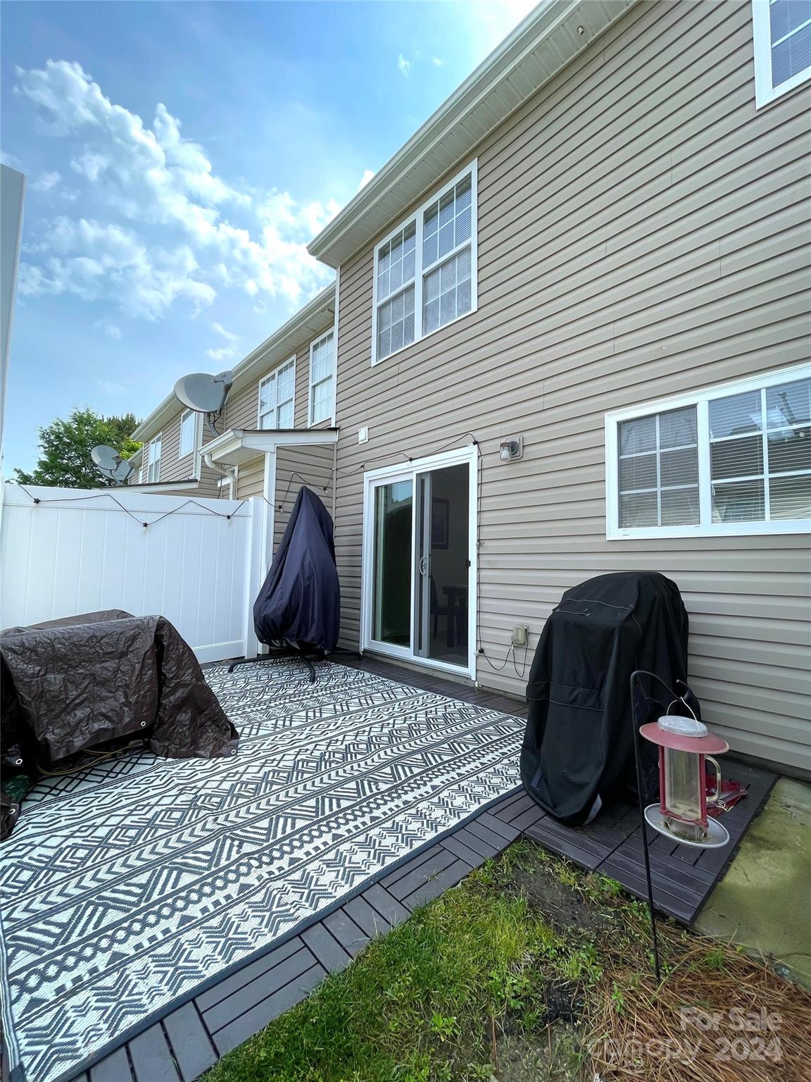 3216 Barons Court Road Charlotte, NC 28213 - Photo 17 of 29 a view of a backyard with furniture and a grill