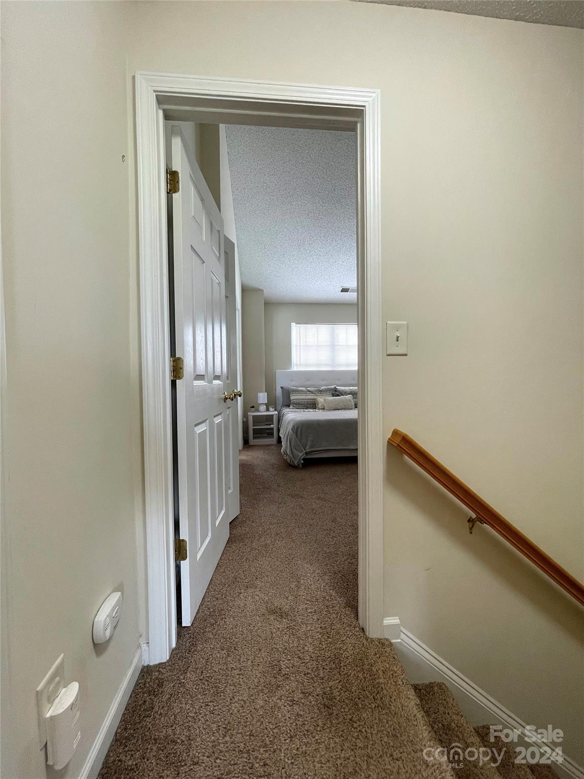 3216 Barons Court Road Charlotte, NC 28213 - Photo 21 of 29 a view of a hallway with bathroom and mirror