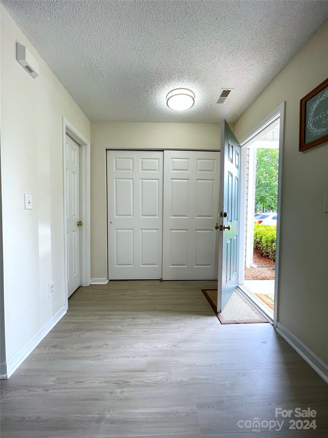 3216 Barons Court Road Charlotte, NC 28213 - Photo 3 of 29 an empty room with windows and closet