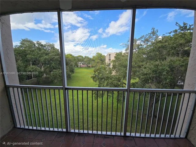 a view of a big room with windows and bathroom