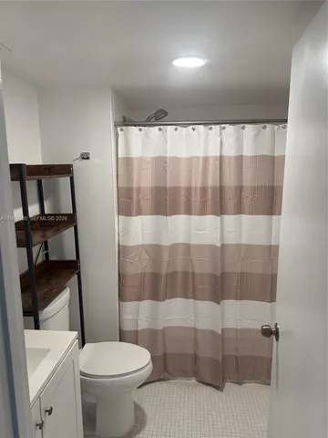 a utility room with washer and dryer