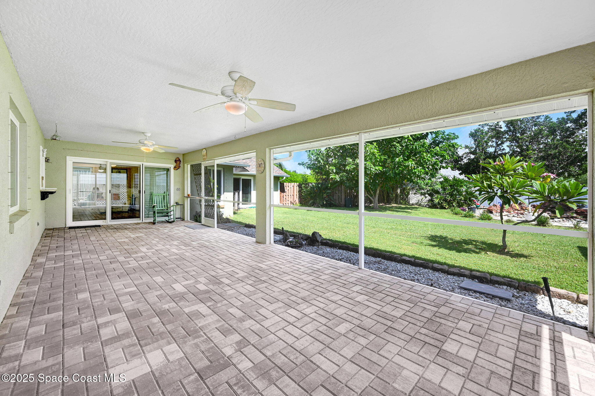 1507 Meadowbrook Road Northeast Palm Bay, FL 32905 - Photo 30 of 50 11x33 Covered and Screened in Lanai
