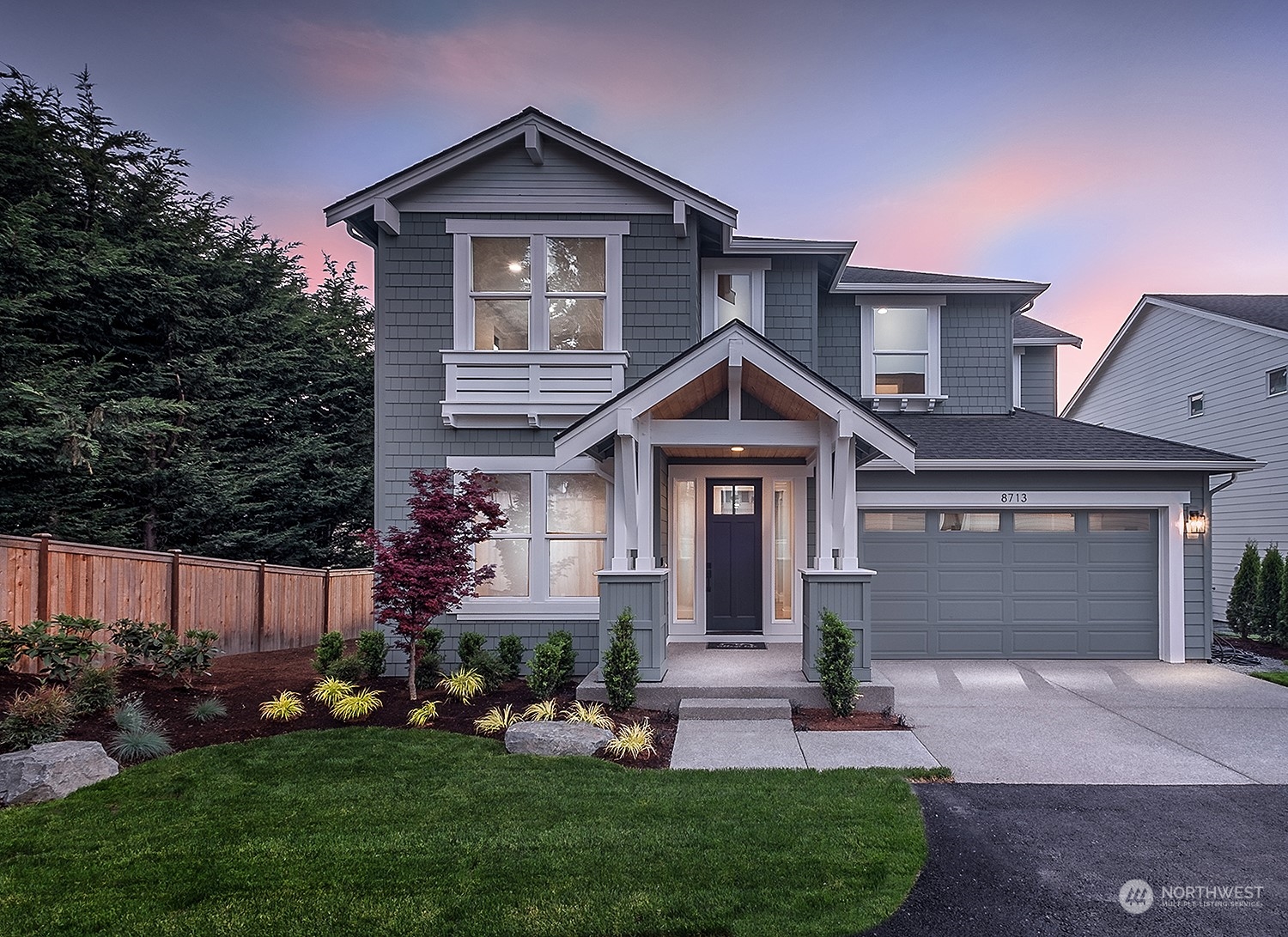 8713 Northeast 204th Street Bothell, WA 98011 - Photo 1 of 25 front view of a house with a yard