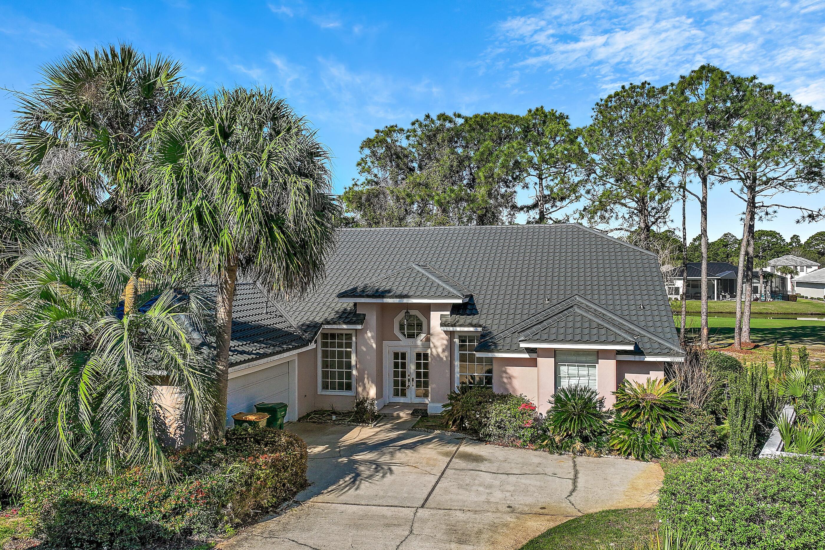 115 Garnet Place Destin, FL 32541 - Photo 1 of 21 front view of house with a yard