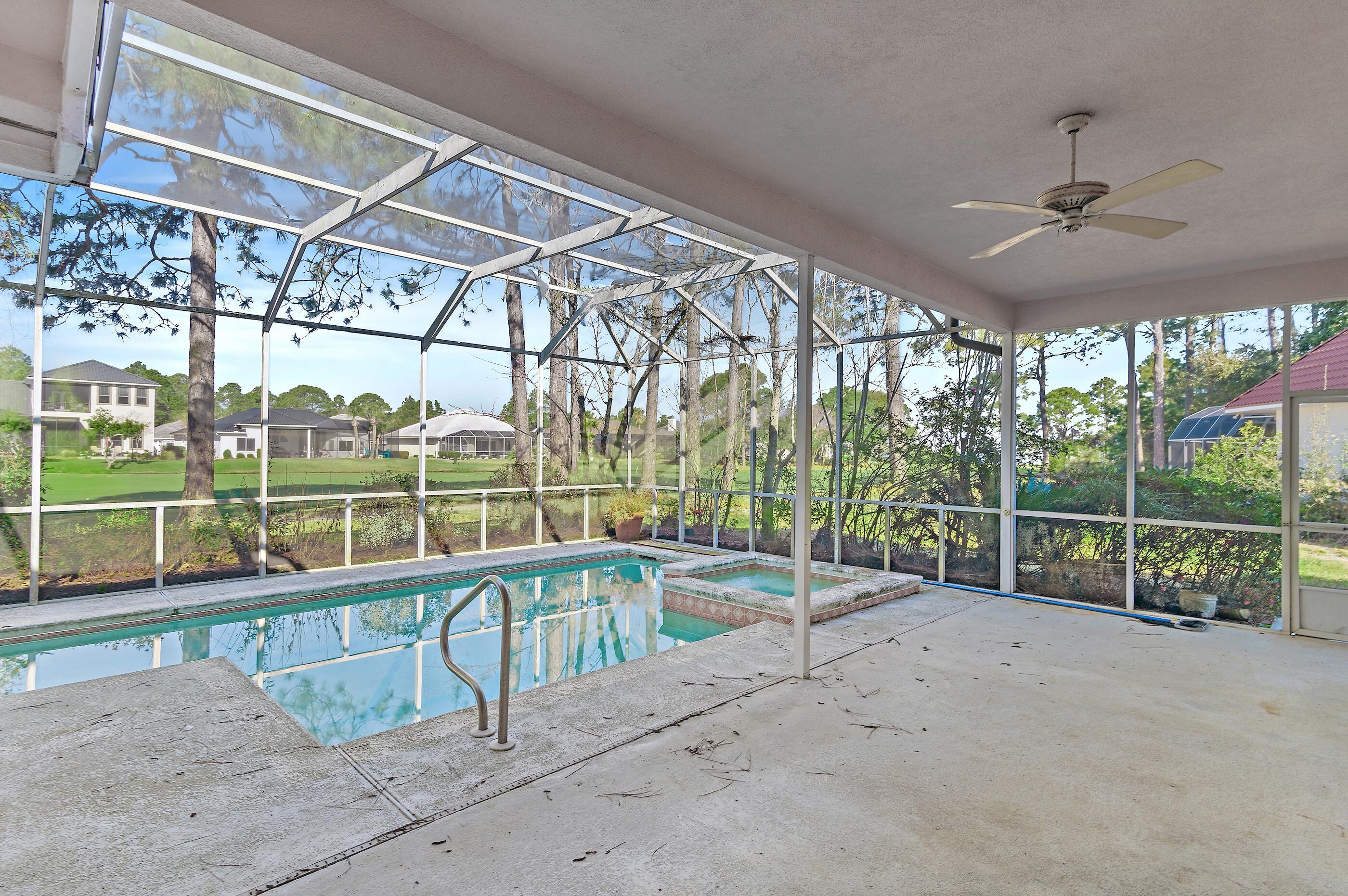 115 Garnet Place Destin, FL 32541 - Photo 9 of 21 a view of a roof deck with wooden floor and fence