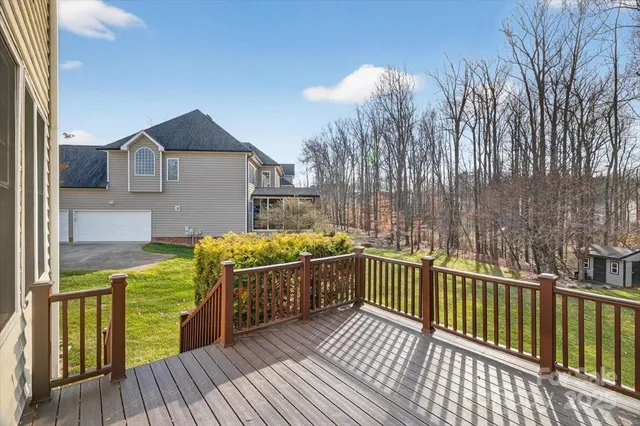 a view of multiple houses with a yard