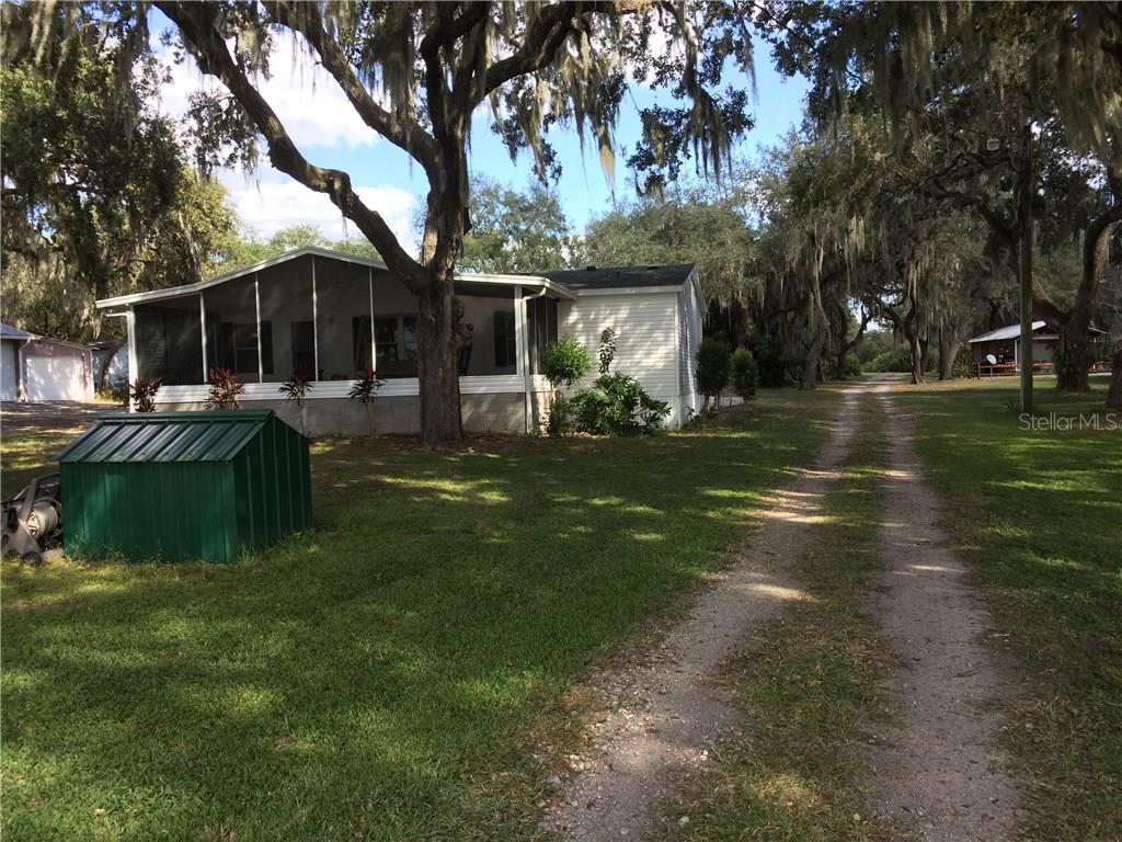 4329 Kotsa Rd Lake Lake Wales, FL 33853 - Photo 1 of 1 a view of a house with backyard