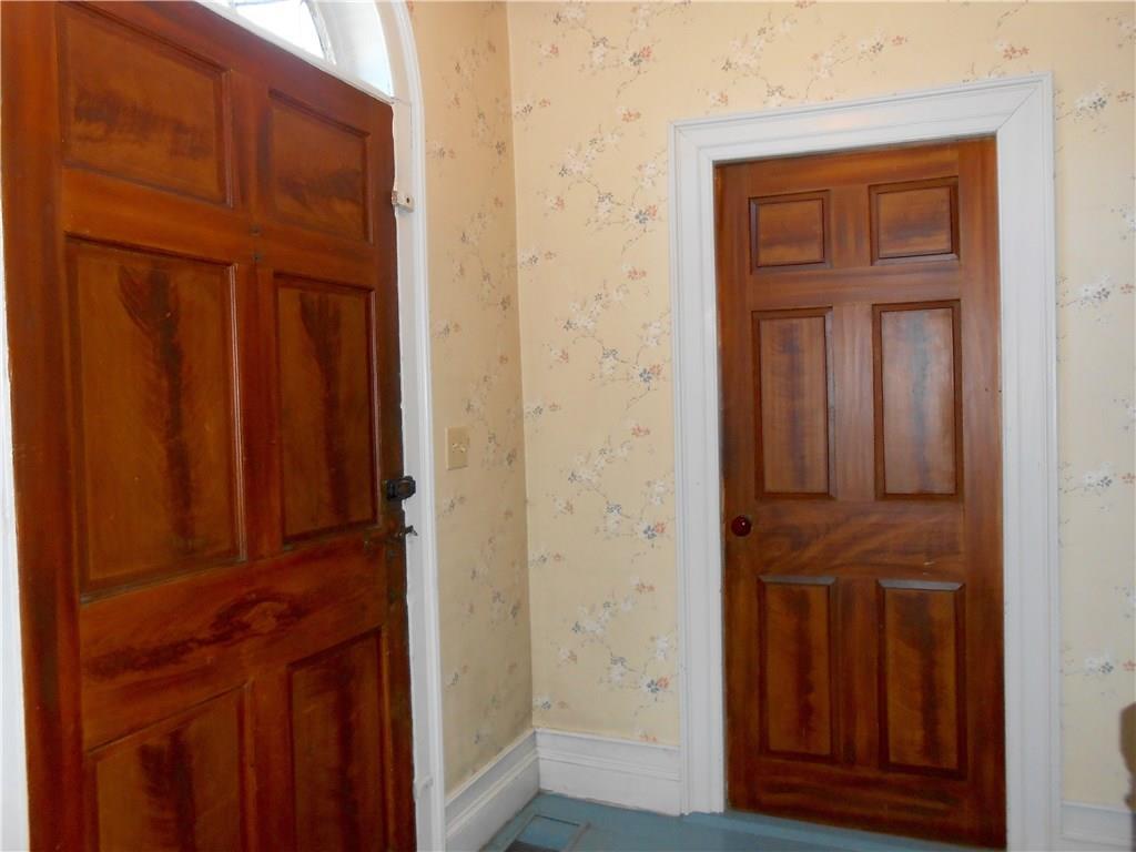 3 River House Road Castine, ME 04421 - Photo 10 of 26 Hallway doors are grain painted.