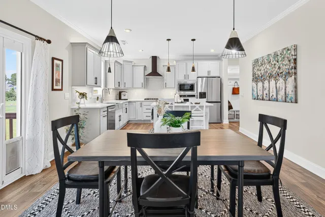 a view of a dining room with furniture