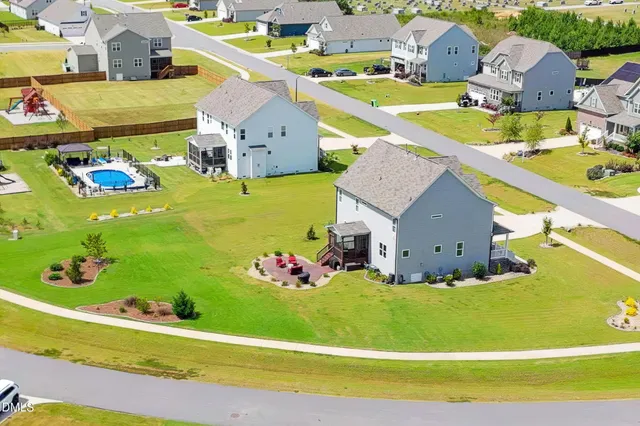 a view of a house with a swimming pool