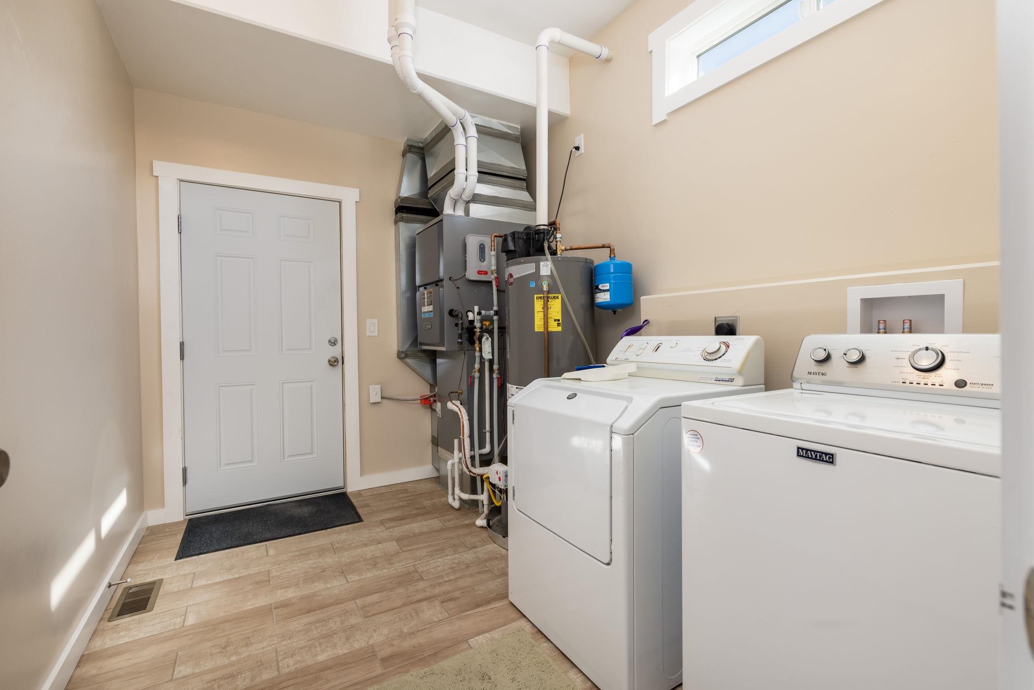 2877 B Road Grand Junction, CO 81503 - Photo 18 of 36 a view of storage and utility room with washer and dryer