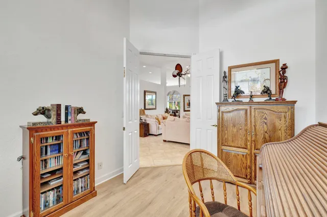 an aerial view of house with yard swimming pool and outdoor seating