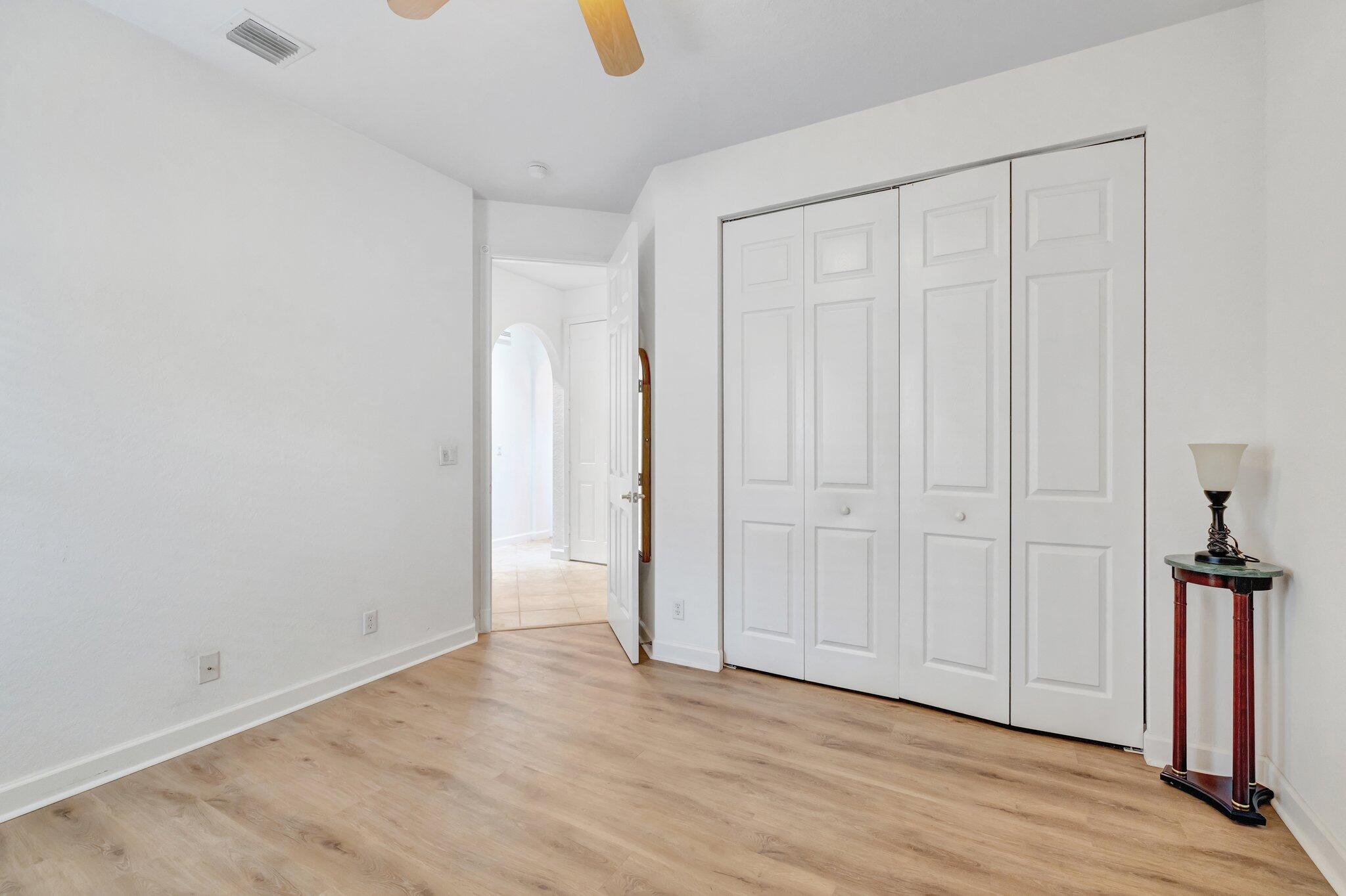 699 Southwest River Bend Circle Stuart, FL 34997 - Photo 47 of 78 a view of a room with wooden floor