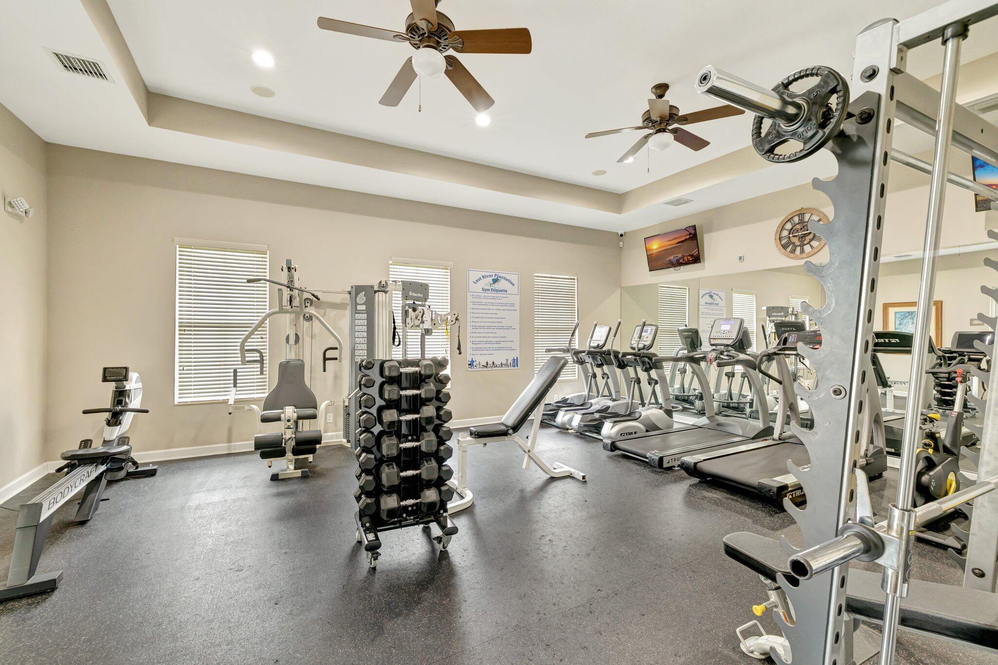 699 Southwest River Bend Circle Stuart, FL 34997 - Photo 54 of 78 a view of a room with gym equipment