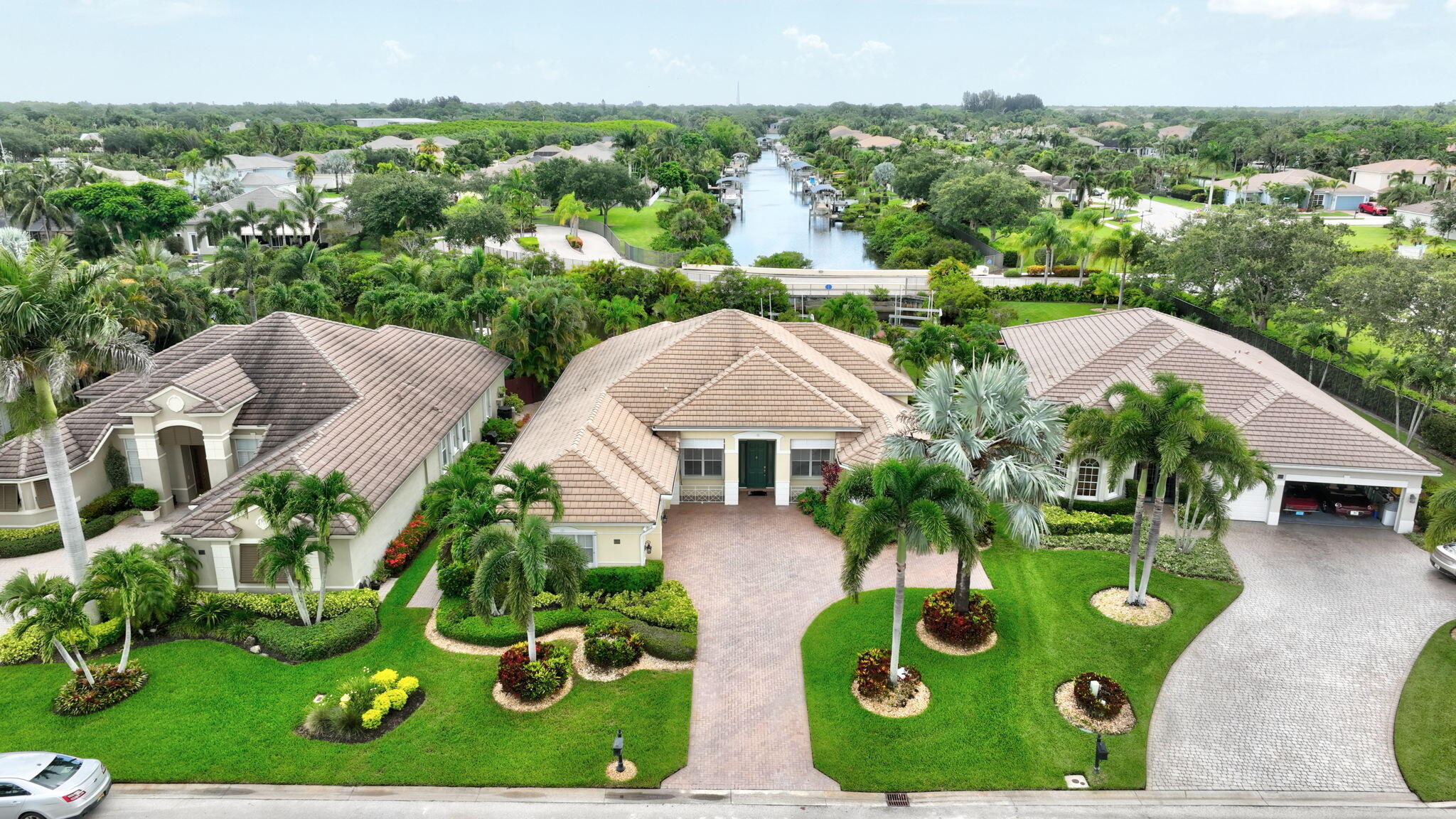 699 Southwest River Bend Circle Stuart, FL 34997 - Photo 62 of 78 an aerial view of a house with yard swimming pool and outdoor seating