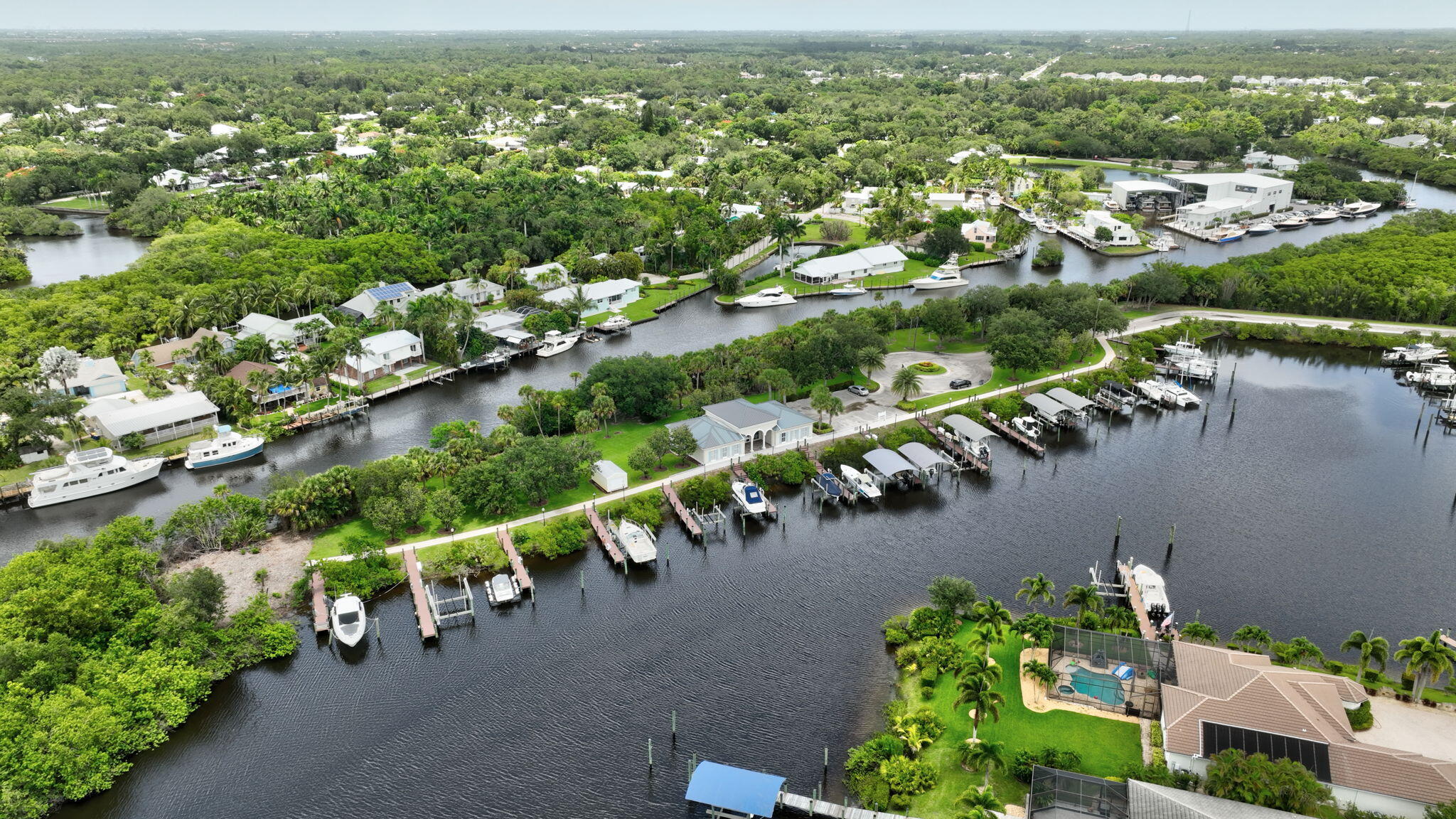 699 Southwest River Bend Circle Stuart, FL 34997 - Photo 77 of 78 an aerial view of a city with houses
