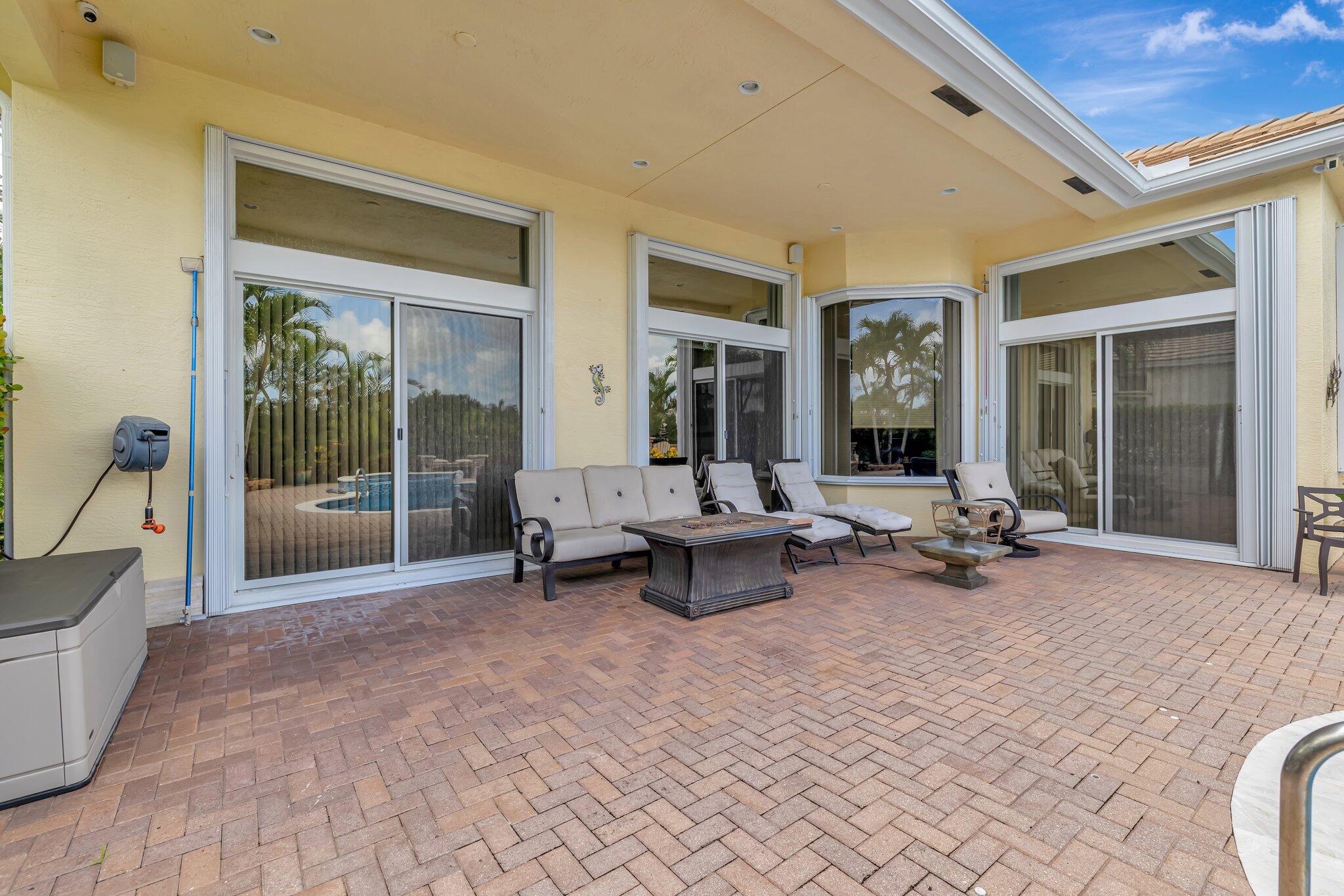699 Southwest River Bend Circle Stuart, FL 34997 - Photo 8 of 78 a living room with furniture and a large window