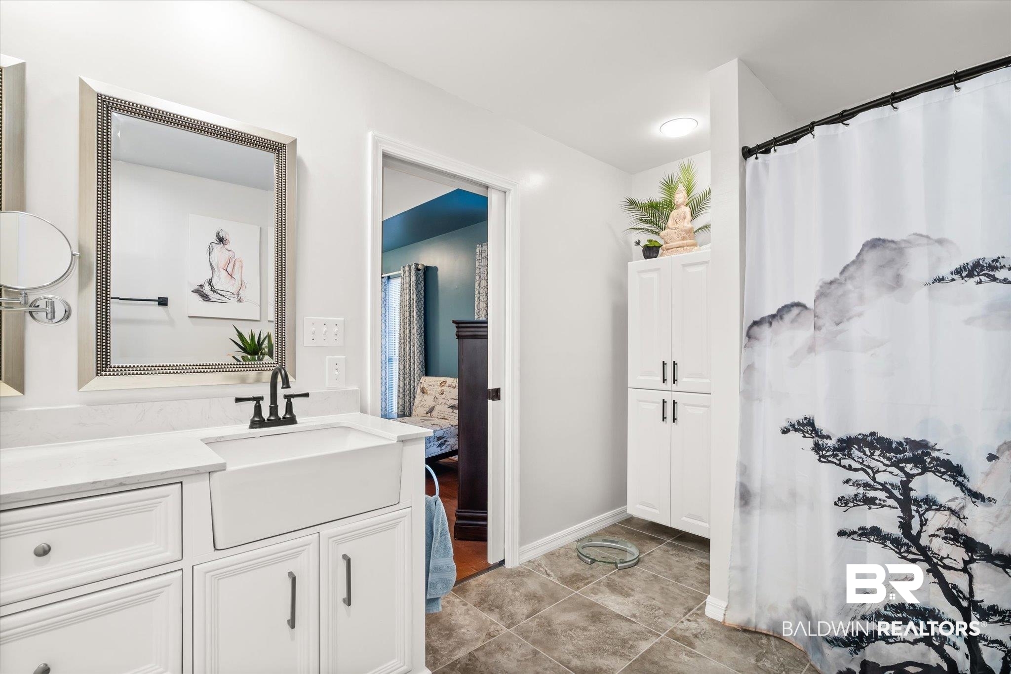 19924 Hunters Loop Fairhope, AL 36532 - Photo 20 of 40 Bathroom with vanity and tile patterned floors