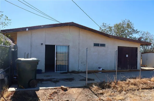 a view of ocean with large building