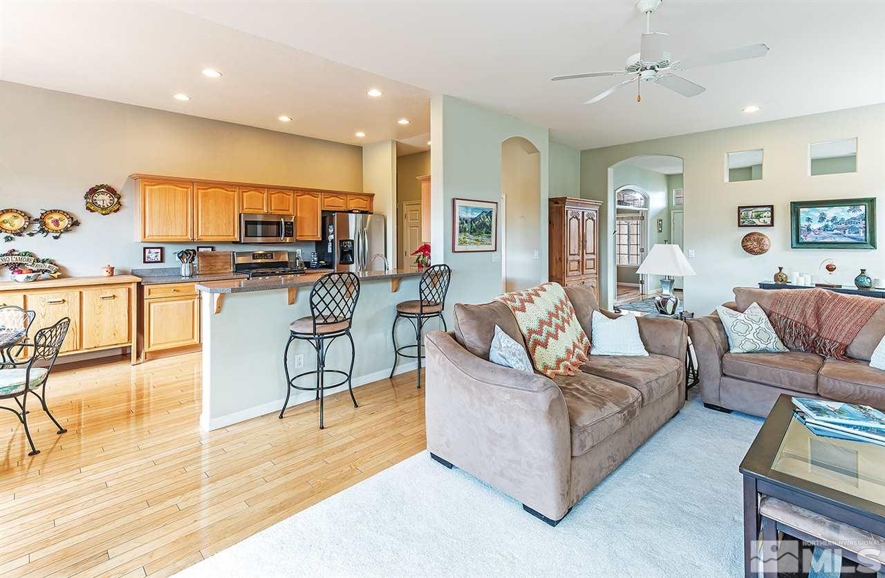 10535 Arbor Way Reno, NV 89521 - Photo 4 of 19 a living room with furniture and a wooden floor