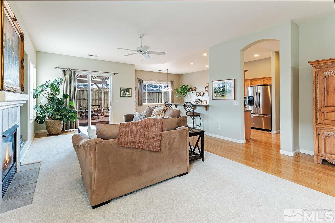 10535 Arbor Way Reno, NV 89521 - Photo 8 of 19 a living room with furniture and a fireplace
