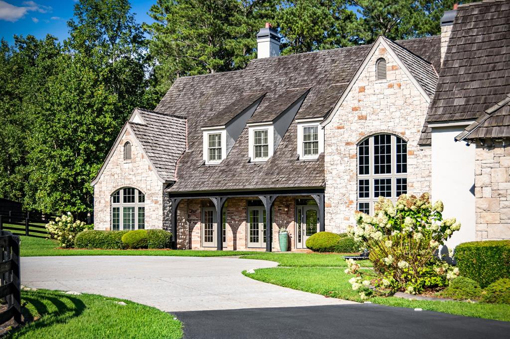 640 A J Land Road Canton, GA 30115 - Photo 12 of 94 a front view of a house with a yard