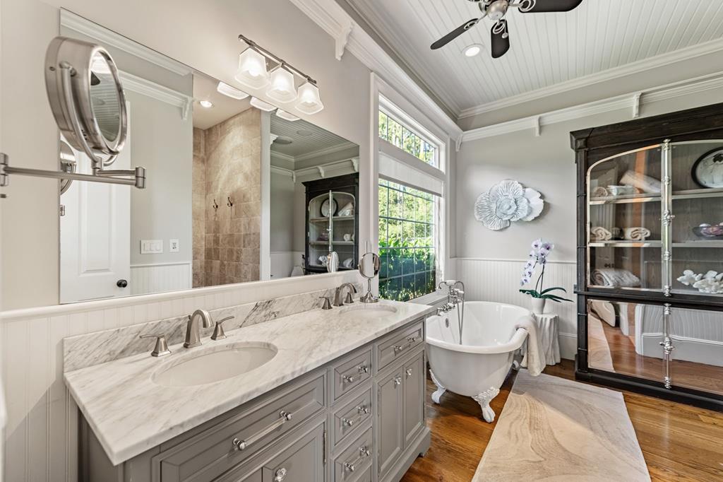 640 A J Land Road Canton, GA 30115 - Photo 29 of 94 a spacious bathroom with a granite countertop sink and a mirror