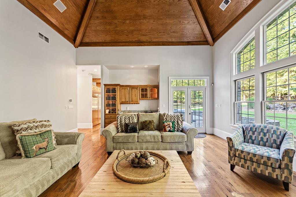 640 A J Land Road Canton, GA 30115 - Photo 34 of 94 a living room with furniture and a large window