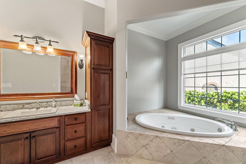 640 A J Land Road Canton, GA 30115 - Photo 39 of 94 a bathroom with a granite countertop sink and a mirror