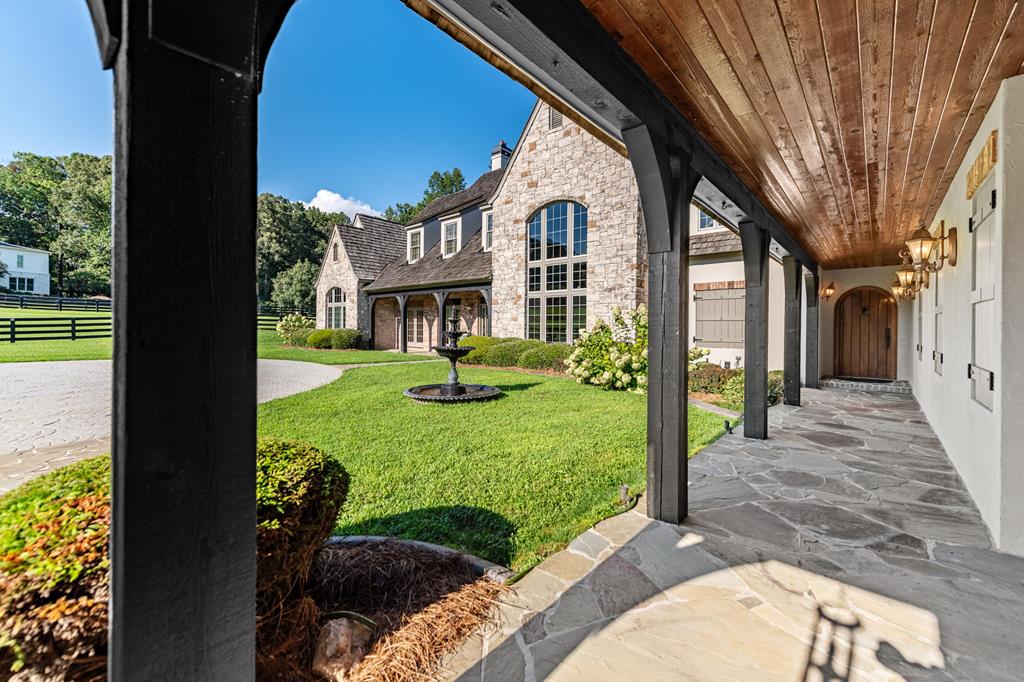 640 A J Land Road Canton, GA 30115 - Photo 74 of 94 a front view of a house with a yard table and chairs