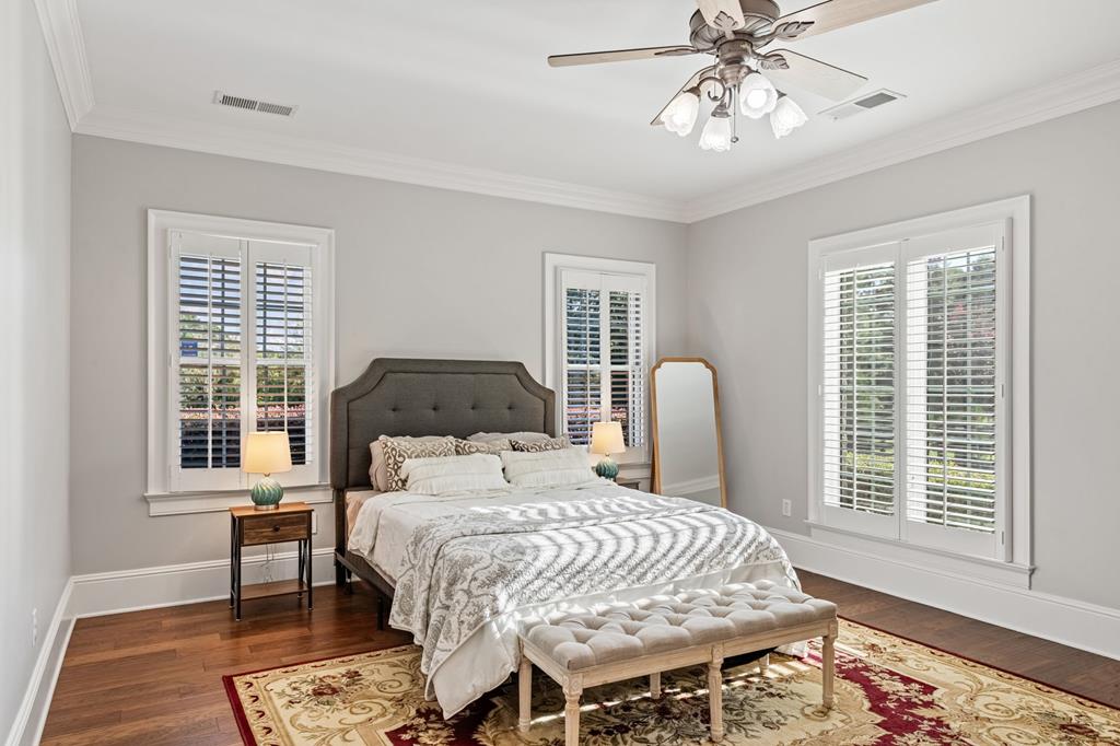 640 A J Land Road Canton, GA 30115 - Photo 78 of 94 a bedroom with a bed large window with wooden floor