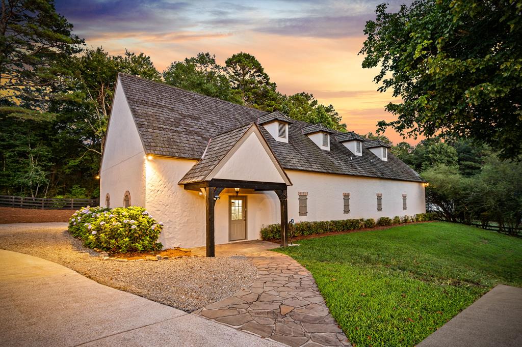 640 A J Land Road Canton, GA 30115 - Photo 80 of 94 a front view of a house with garden