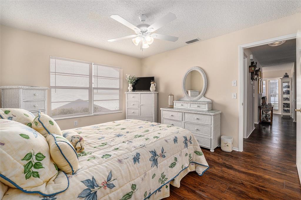 4636 Portland Manor Drive New Port Richey, FL 34655 - Photo 23 of 37 a bedroom with a bed and a dresser