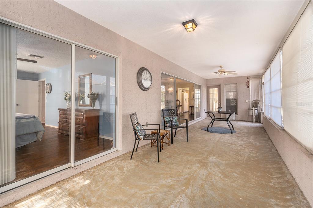 4636 Portland Manor Drive New Port Richey, FL 34655 - Photo 26 of 37 a living room with furniture and a large window
