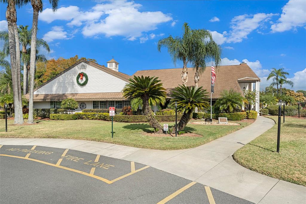 4636 Portland Manor Drive New Port Richey, FL 34655 - Photo 30 of 37 a front view of a house with garden