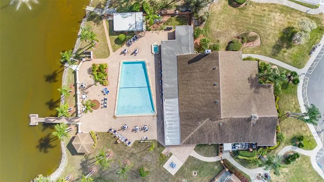 an aerial view of a house with outdoor space