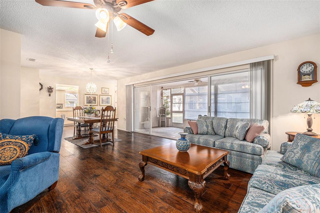 4636 Portland Manor Drive New Port Richey, FL 34655 - Photo 8 of 37 a living room with furniture and a large window