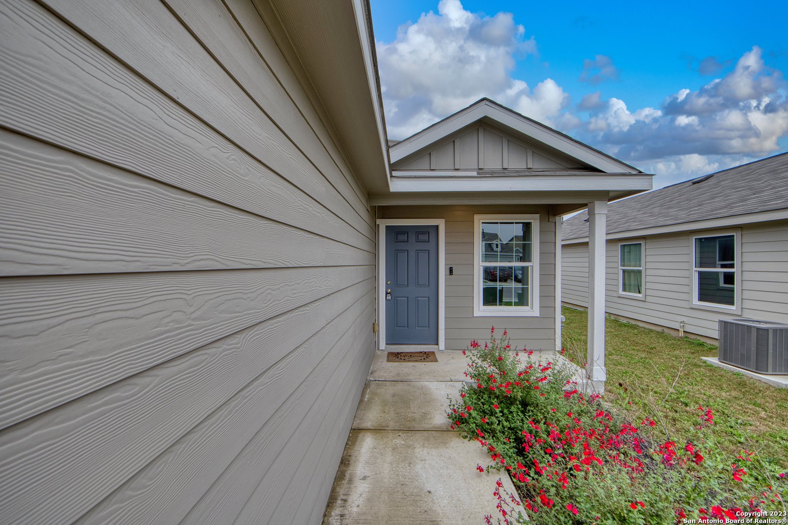a front view of house with an outdoor space