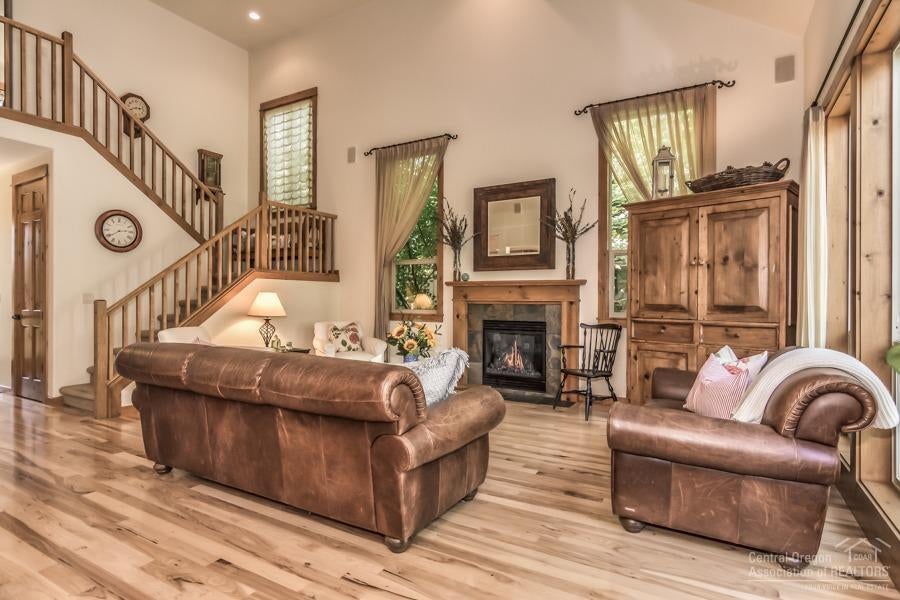 19505 Sugar Mill Loop Bend, OR 97702 - Photo 3 of 23 Inviting great room features a gas firep
