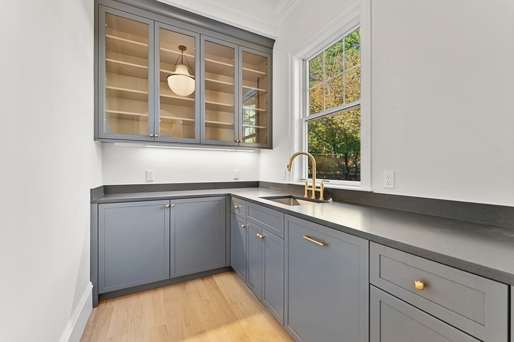 1266 South Street Needham, MA 02492 - Photo 12 of 32 a kitchen with a sink and a window