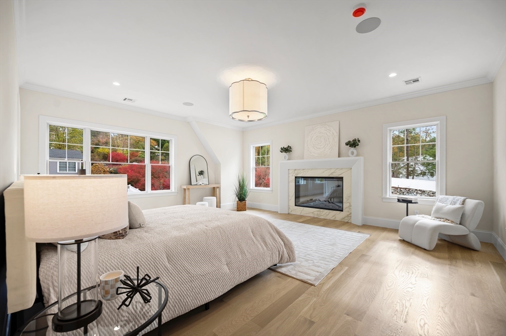 1266 South Street Needham, MA 02492 - Photo 17 of 32 a bedroom with a bed and a couch