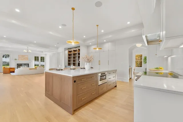 a view of a livingroom with furniture window and wooden floor