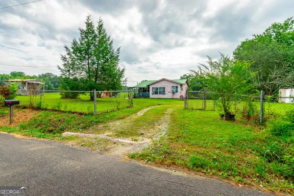 a view of a park with swings and slides