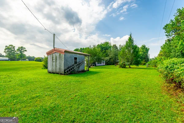 a fire hydrant in the middle of a field