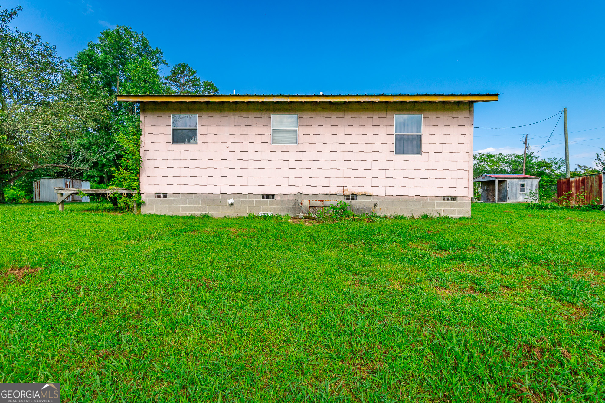 77 Bolton Road Trenton, GA 30752 - Photo 21 of 47 a backyard of a house with lots of green space