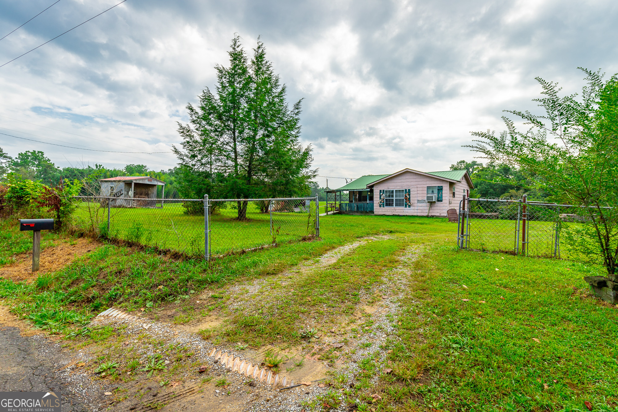 77 Bolton Road Trenton, GA 30752 - Photo 24 of 47 a view of a house with a big yard