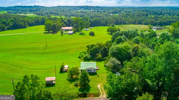 a view of a golf course with a lake view
