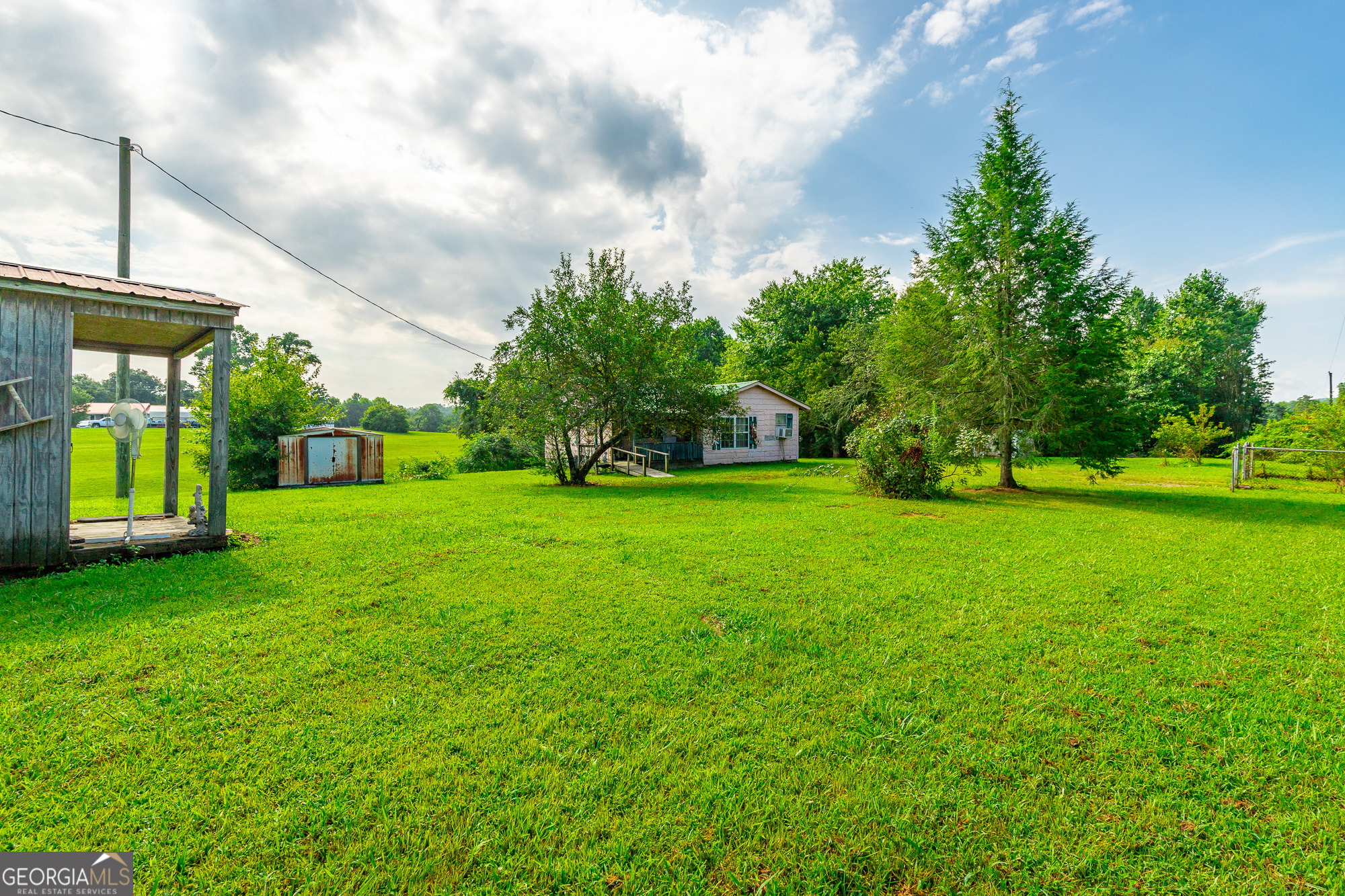 77 Bolton Road Trenton, GA 30752 - Photo 4 of 47 a view of yard with swimming pool and green space