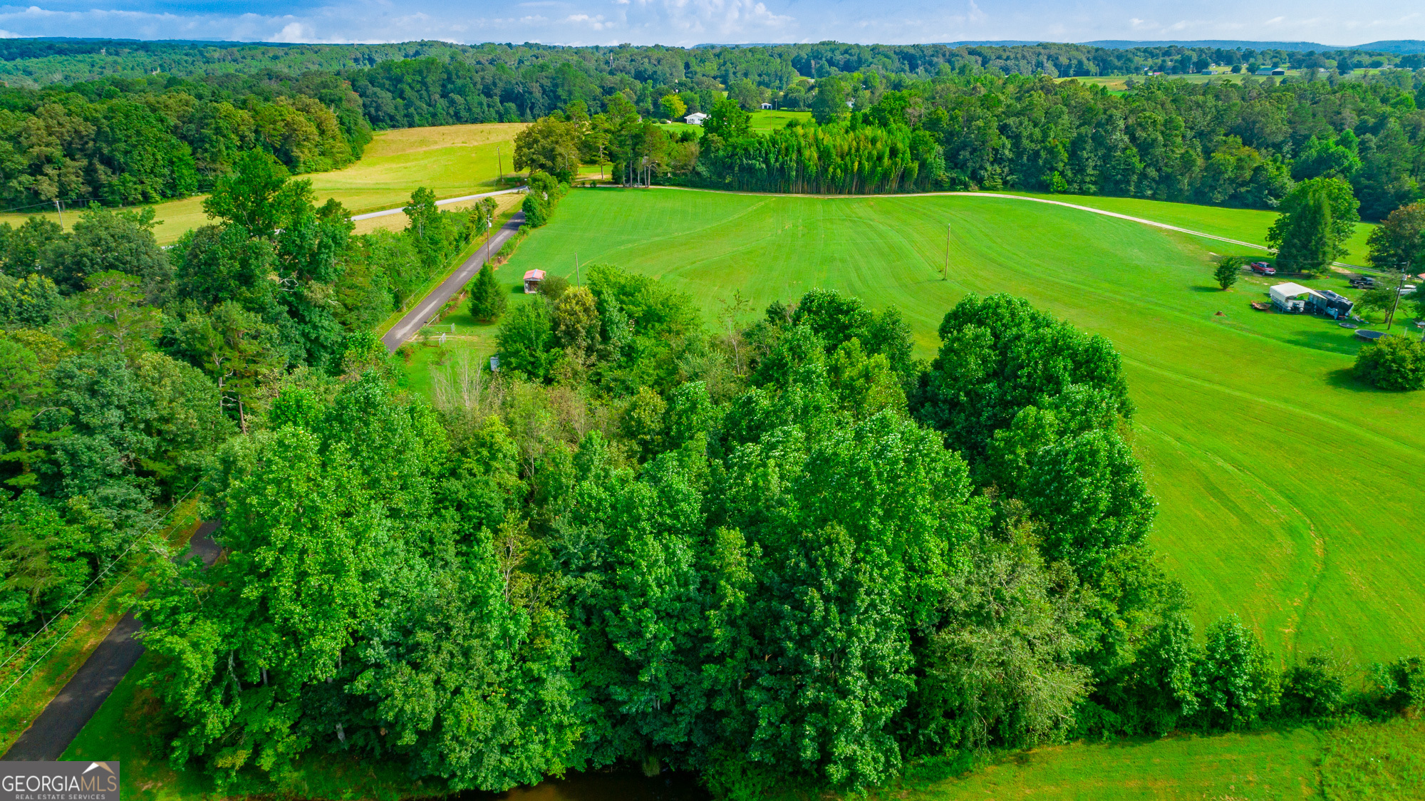 77 Bolton Road Trenton, GA 30752 - Photo 44 of 47 a view of a golf course with a garden