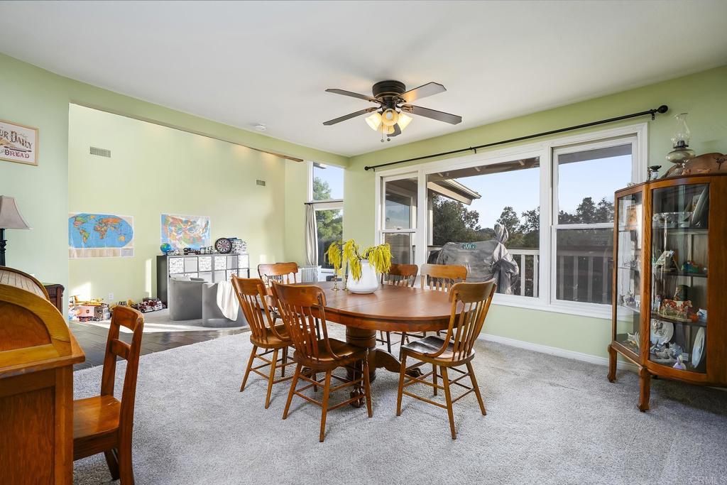 23002 Japatul Valley Road Alpine, CA 91901 - Photo 24 of 65 a view of a dining room with furniture window and outside view